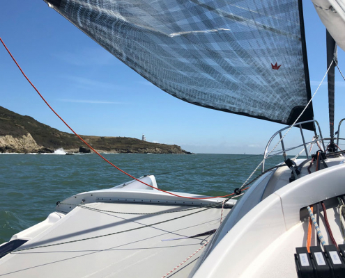 Dragonfly 28 trimaran approaching St Cats, RORC Race the Wight
