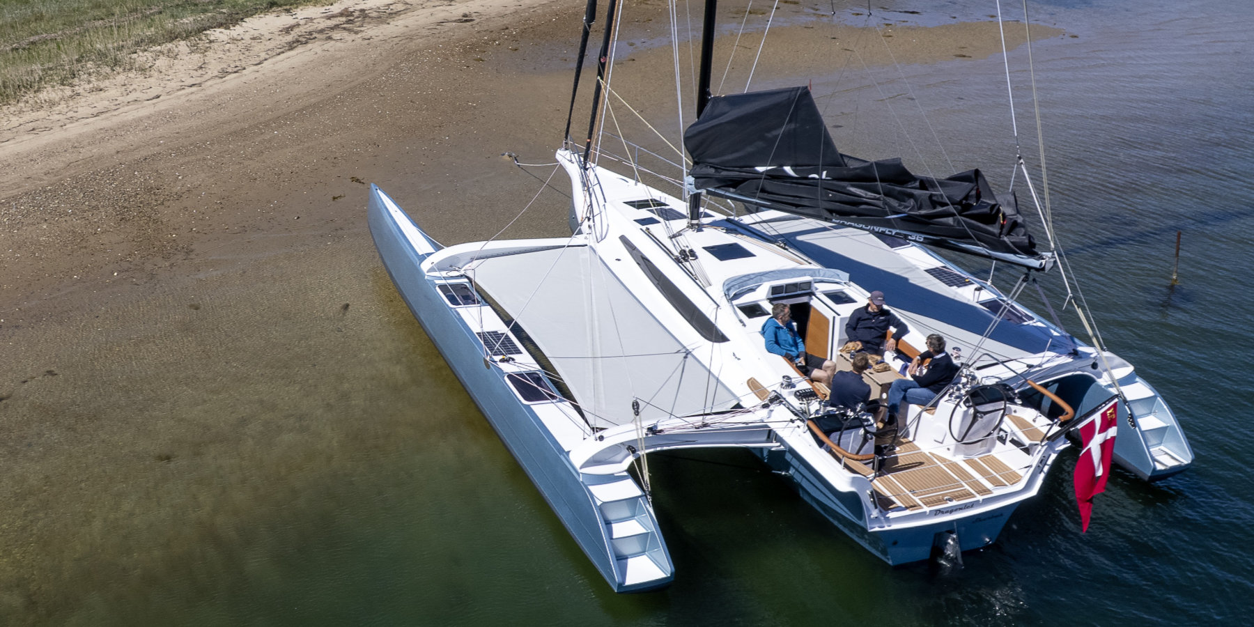 Dragonfly 36 anchored in shallow water